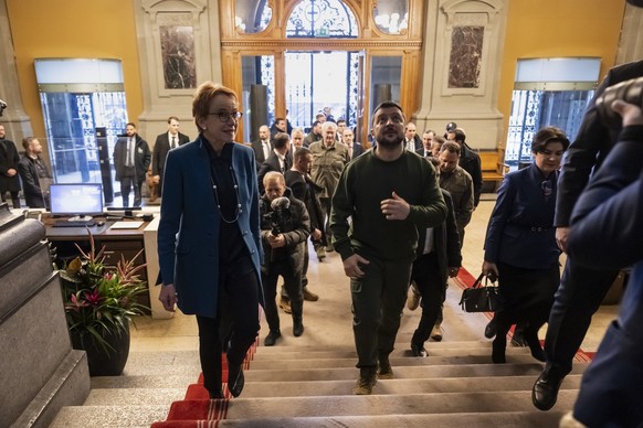 Volodymyr Zelenskyy, President of Ukraine, right, is welcomed by Eva Herzog, President of the Swiss Council of States, left, on Monday, January 15, 2024 in the Federal Palace, the Bundeshaus, in Bern, ...