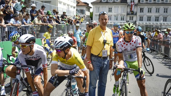 Olivier Senn, chief race start section of the Tour de Suisse, poses for photographer during the 4th stage, a 160,4 km race, from Heiden to Ossingen, at the 78th Tour de Suisse UCI ProTour cycling race ...