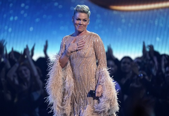 Pink performs &quot;Hopelessly Devoted To You&quot; during a tribute to the late singer Olivia Newton-John at the American Music Awards on Sunday, Nov. 20, 2022, at the Microsoft Theater in Los Angele ...