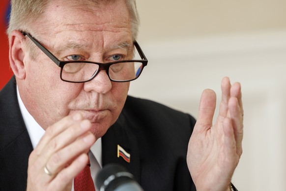 epa10591986 Gennady Gatilov, Ambassador of the Permanent Representative Mission of the Russia to the UN Geneva, talks to journalists at the Permanent Mission of the Russian Federation to the United Na ...