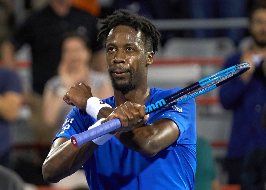 epa07763204 Gael Monfils of France celebrates his victory against Hubert Hurkacz of Poland during the Men&#039;s Singles round of 16 at the Rogers Cup tennis tournament in Montreal, Canada, 08 August  ...