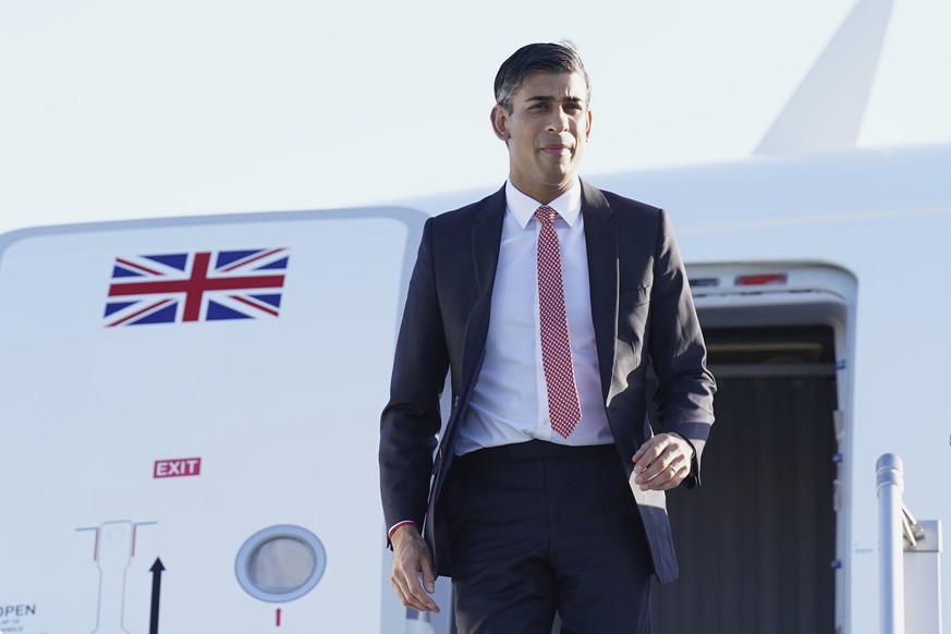 British Prime Minister Rishi Sunak disembarks his plane as he arrives in San Diego, Sunday, March 12, 2023, for meetings with U.S. President Joe Biden and Australia Prime Minister Anthony Albanese in  ...