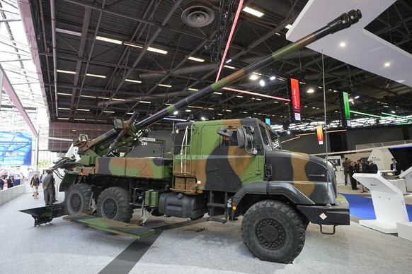 A French artillery piece Caesar is photographed at the Eurosatory arms show in Villepinte, north of Paris, Tuesday, June 14, 2022. The truck-mounted Caesar cannons fire six rounds per minute over 40 k ...