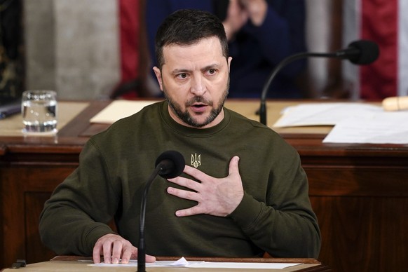 FILE - Ukrainian President Volodymyr Zelenskyy addresses a joint meeting of Congress on Capitol Hill in Washington, Dec. 21, 2022. President Joe Biden on Thursday, Dec. 29, signed a $1.7 trillion spen ...