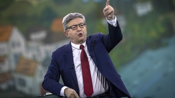 French Far-left presidential candidate for the 2022 election Jean-Luc Melenchon gestures as he speaks during a meeting in Nantes, western France, Sunday, Jan. 16, 2022. Far-left French presidential ca ...