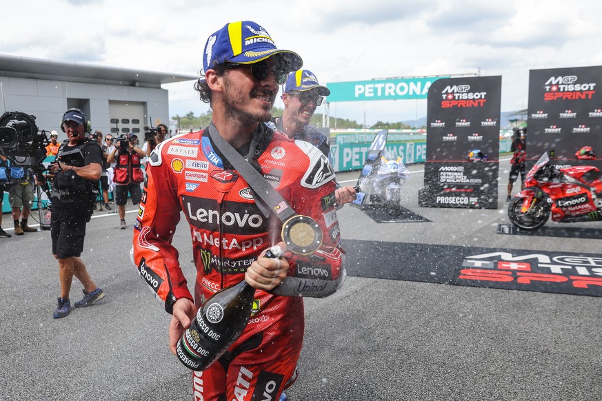 epa12480576 Italian MotoGP rider Francesco Bagnaia of Ducati Lenovo Team celebrates after winning the Tissot Sprint race at the Malaysia Motorcycling Grand Prix in in Sepang, Malaysia, 25 October 2025 ...