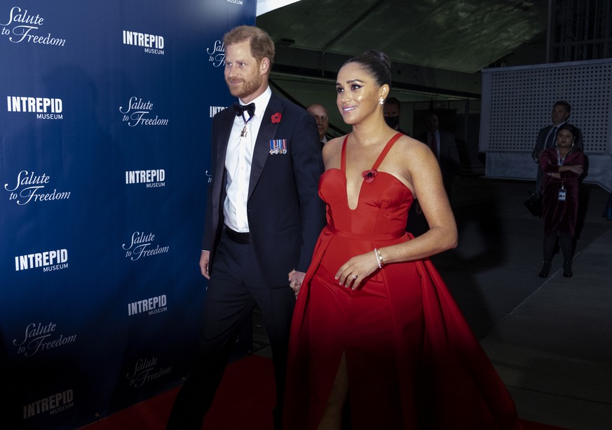 Prince Harry and Meghan Markle, Duke and Duchess of Sussex, arrive at the Intrepid Sea, Air &amp; Space Museum for the Salute to Freedom Gala Wednesday, Nov. 10, 2021, in New York. The Duke of Sussex  ...