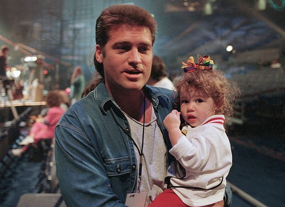 Memphis - October 08: Singer/Songwriter Billy Ray Cyrus and daughter Miley Cyrus attends Elvis: The Tribute at The Pyramid Arena in Memphis Tennessee October 08, 1994 (Photo By Rick Diamond/Getty Imag ...