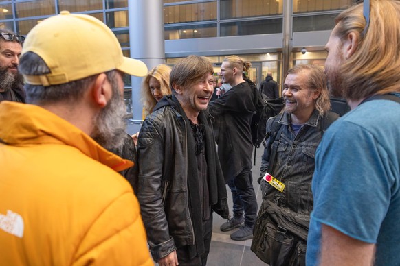 epa11117716 Members of the Russian-Belarusian Rock Band Bi-2 arrive at the Ben Gurion airport in Tel Aviv, Israel, 01 February 2024. The band, critical of Russia?s invasion of Ukraine, were deported f ...