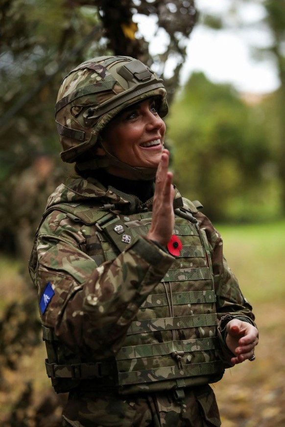 DEREHAM, ENGLAND - NOVEMBER 8: Catherine, Princess of Wales reacts as she visits The Queen's Dragoon Guards Regiment for the first time as their Colonel in Chief on November 8, 2023 in Dereham, E ...