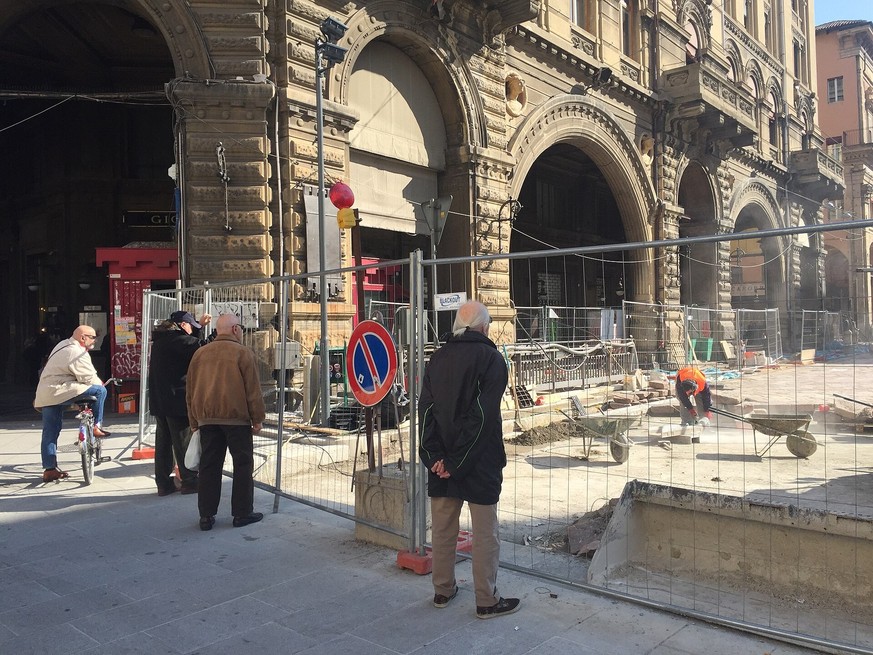 Umarells in Piazza Maggiore, Bologna. Originated from the Bolognese dialect word umarèl (&amp;quot;little man&amp;quot;), and increasingly used in other parts of Italy since 2010s, the term referring  ...