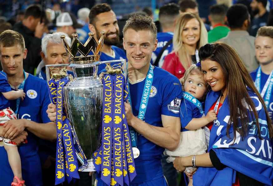 FILE - Leicester's Jamie Vardy lifts the trophy as Leicester City celebrate becoming the English Premier League soccer champions at King Power stadium in Leicester, England, Saturday, May 7, 2016 ...