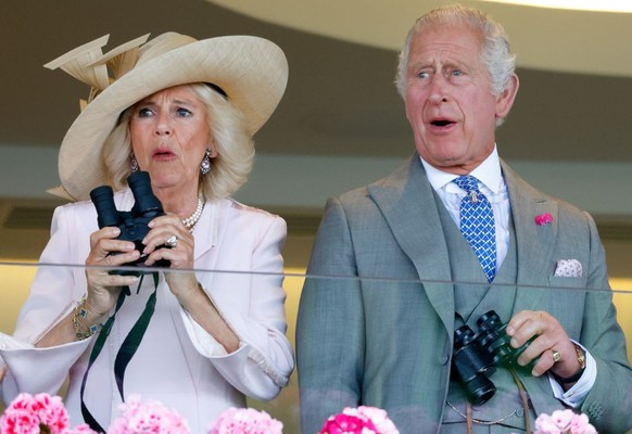 ASCOT, UNITED KINGDOM - JUNE 24: (EMBARGOED FOR PUBLICATION IN UK NEWSPAPERS UNTIL 24 HOURS AFTER CREATE DATE AND TIME) Queen Camilla, King Charles III and Lady Gabriella Windsor watch, from the Royal ...