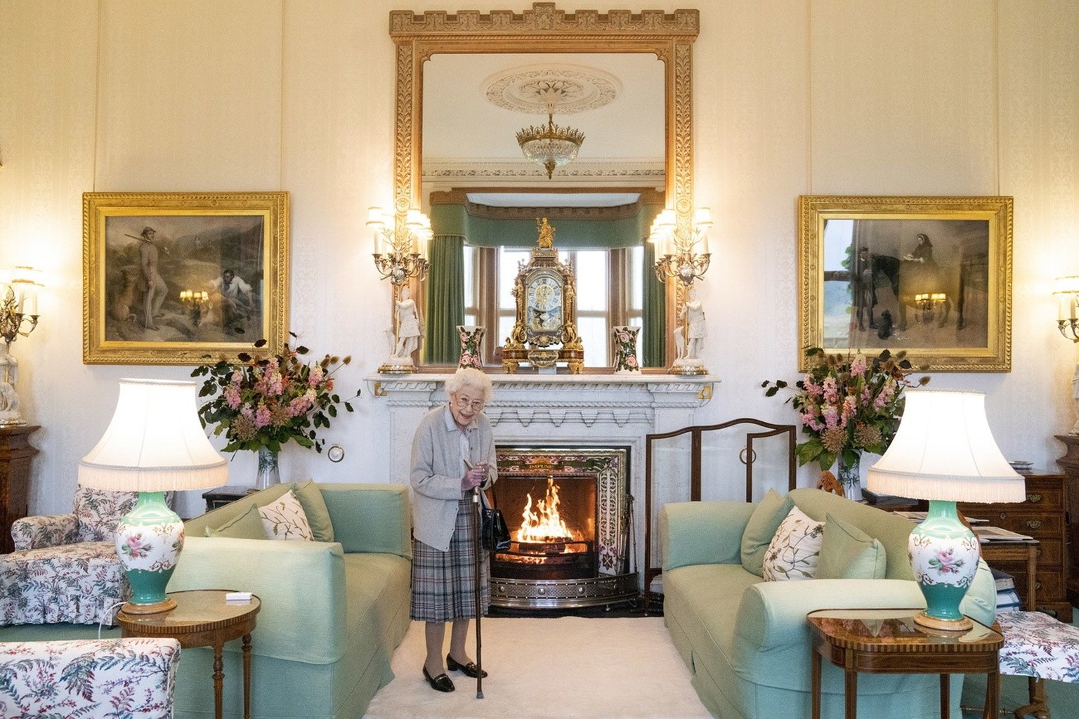 epa10164071 Queen Elizabeth II waits in the Drawing Room before receiving Liz Truss for an audience at Balmoral, Scotland, Britain 06 September 2022. Truss was in Balmoral for an audience with Queen E ...