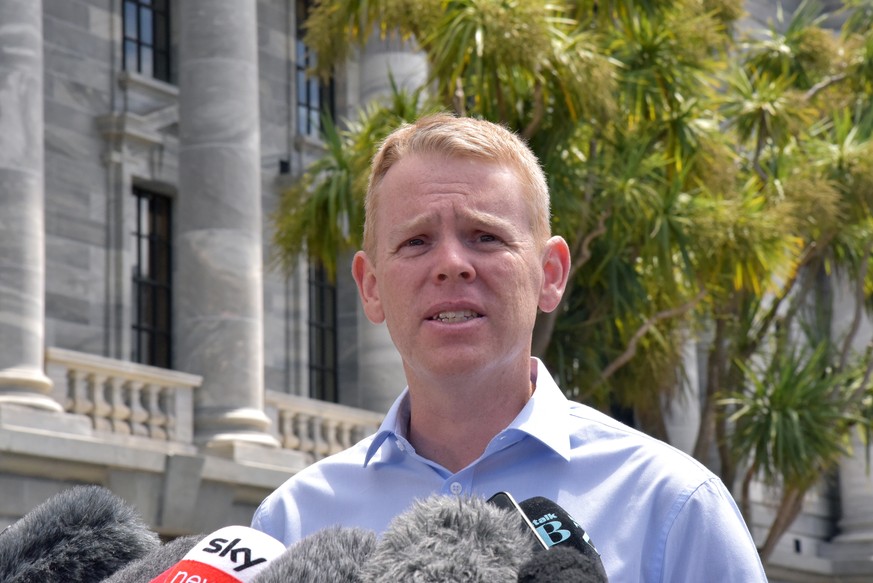 epa10419247 New Zealand Police Minister Chris Hipkins speaks to media outside Parliament House in Wellington, New Zealand, 21 January 2023. Hipkins is the sole candidate to succeed Jacinda Ardern as L ...