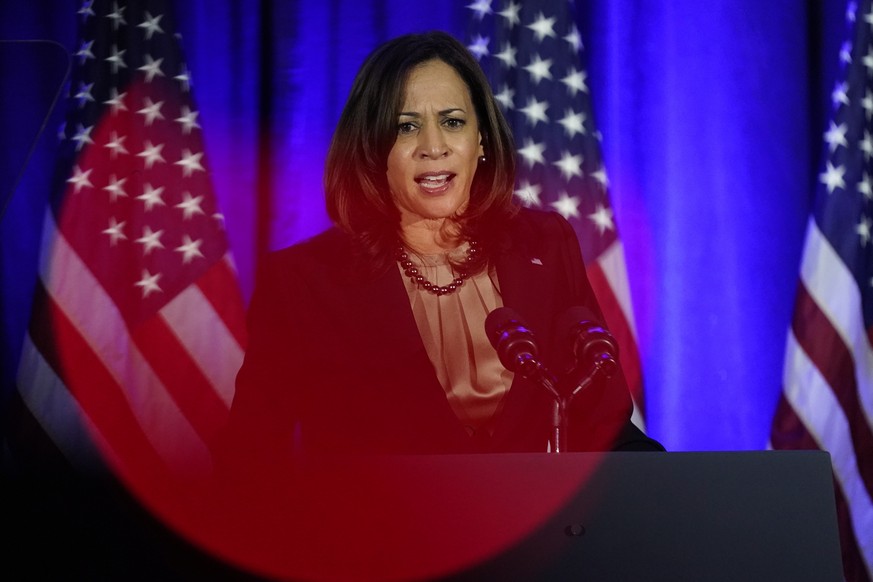 Vice President Kamala Harris speaks before President Joe Biden at a Democratic National Committee holiday party, Tuesday, Dec. 14, 2021, in Washington. (AP Photo/Patrick Semansky)