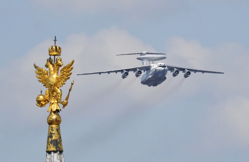Russian Beriev A-50 early warning plane flies over Red Square in Moscow during the military parade to commemorate the 75th anniversary of Victory in World War II, in Moscow, Russia, 24 June 2020. The  ...