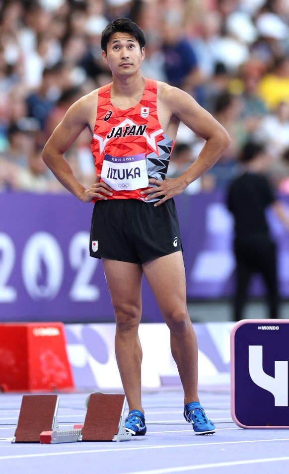 PARIS, FRANCE - AUGUST 05: Shota Iizuka of Team Japan looks on during the during the Men&#039;s 200m Round 1 on day ten of the Olympic Games Paris 2024 at Stade de France on August 05, 2024 in Paris,  ...