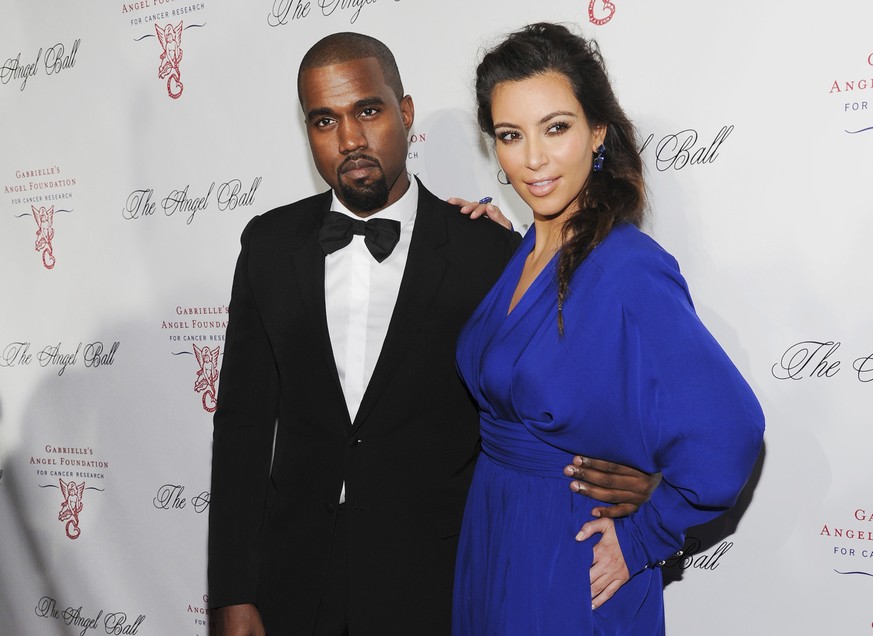 FILE - Kanye West, left, and Kim Kardashian attend Gabrielle&#039;s Angel Foundation Angel Ball cancer research benefit on Oct. 22, 2012, in New York. Kim Kardashian West filed for divorce Friday, Feb ...