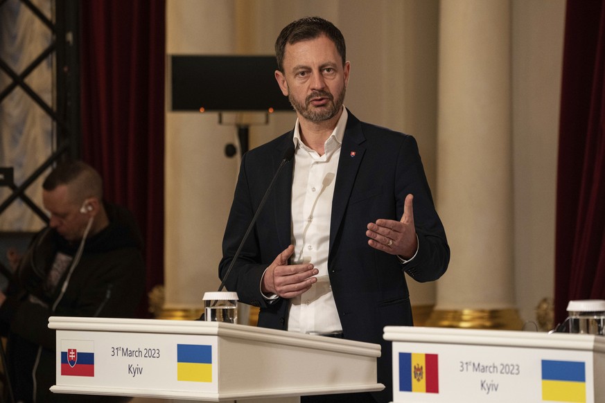 Slovakian Prime Minister Eduard Heger speaks to media at a joint press conference with Moldova's President Maia Sandu, Ukraine's President Volodymyr Zelenskyy, Slovenia's Prime Minister ...
