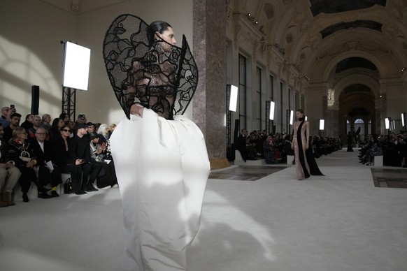 A model wears a creation for Schiaparelli's Haute Couture Spring-Summer 2024 collection presented in Paris, Monday, Jan. 22, 2024. (AP Photo/Christophe Ena)