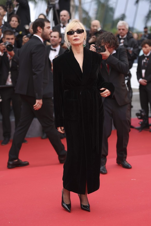 Camera d'or jury member Emmanuelle Beart poses for photographers upon arrival at the awards ceremony and the premiere of the film 'The Second Act' during the 77th international film fes ...
