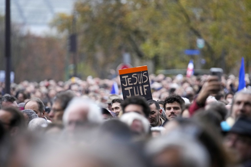 Thousands gather for a march against antisemitism in Paris, France, Sunday, Nov. 12, 2023. French authorities have registered more than 1,000 acts against Jews around the country in a month since the  ...