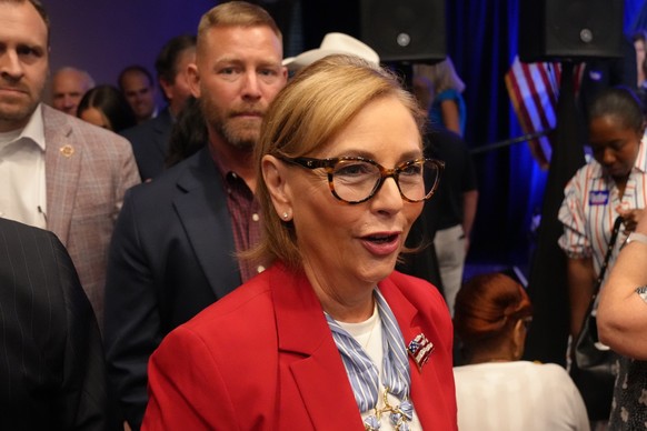 Sen. Darline Graham, R-S.C., heads out into the crowd after winning a special Republican primary runoff to replace her brother, the Sen. Lindsey Graham, R-S.C., in the November general election, Tuesd ...