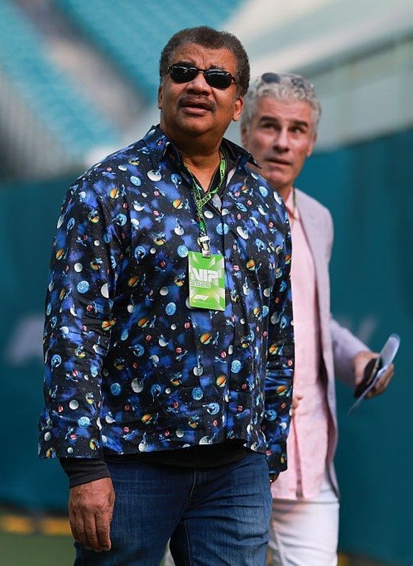Astrophysicist Neil deGrasse Tyson arrives in the team village ahead of the Formula 1 Crypto.com Miami Grand Prix at the Miami International Autodrome in Miami Gardens, Florida, United States, on May  ...