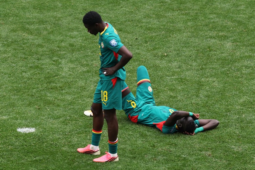 Players of Senegal react after the World Cup round of 32 soccer match against Belgium in Seattle, Wednesday, July 1, 2026. (AP Photo/Maddy Grassy)