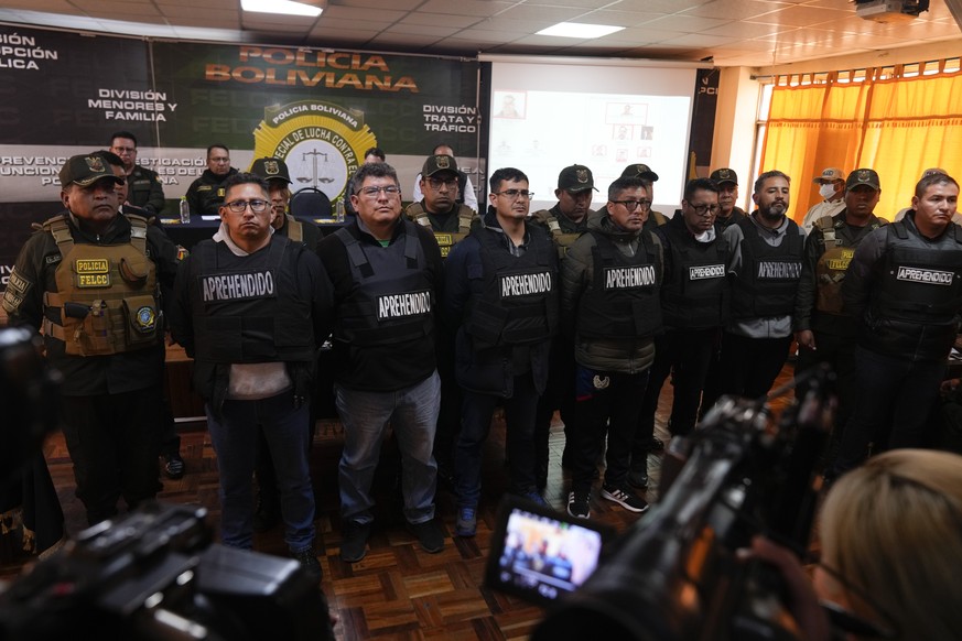 People arrested in connection with the previous day&#039;s uprising are presented by police to the press in La Paz, Bolivia, Thursday, June 27, 2024. The government announced more arrests over their a ...