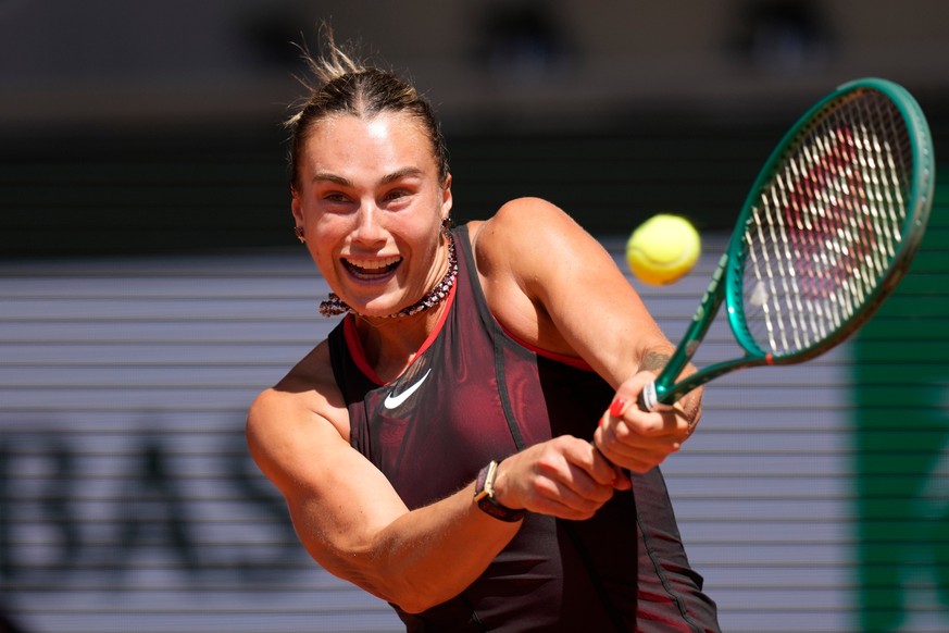 Aryna Sabalenka of Belarus returns to Jessica Bouzas Maneiro of Spain during their first round women's singles tennis match at the French Open tennis tournament in Paris, Tuesday, May 26, 2026. ( ...
