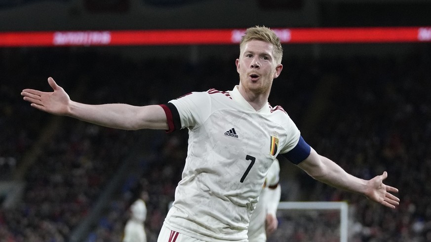 FILE - Belgium&#039;s Kevin De Bruyne celebrates after scoring his side&#039;s opening goal during the World Cup 2022 group E qualifying soccer match between Wales and Belgium at Cardiff City stadium  ...