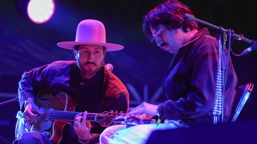 Estevan Gutierrez, left, and Alejandro Gutierrez of the band Hermanos Gutierrez perform during the Corona Capital music festival in Mexico City, Sunday, Nov. 17, 2024. (AP Photo/Eduardo Verdugo)