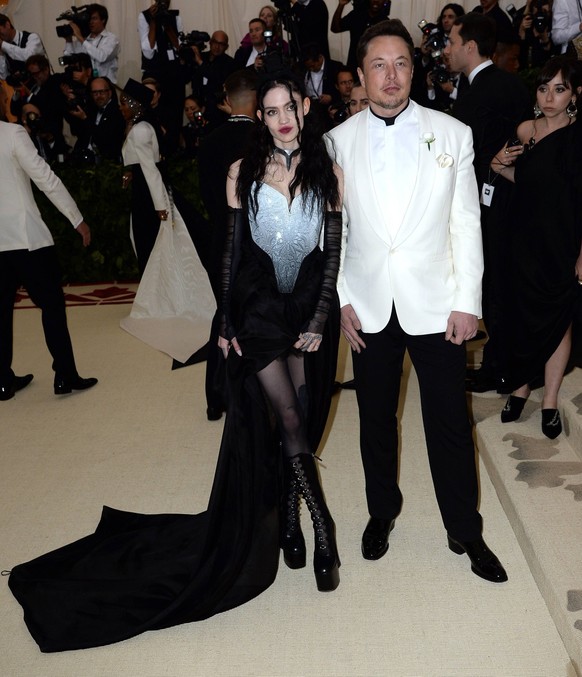 Elon Musk and Grimes arriving at Heavenly Bodies: Fashion &amp;amp; The Catholic Imagination Costume Institute Gala at the Metropolitan Museum of Art on May 7, 2018 in New York City