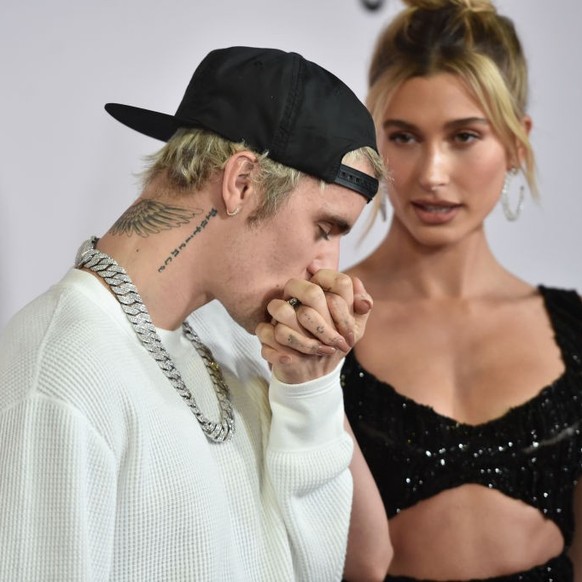 LOS ANGELES, CALIFORNIA - JANUARY 27: Justin Bieber and Hailey Bieber attend the premiere of YouTube Original&#039;s &quot;Justin Bieber: Seasons&quot; at the Regency Bruin Theatre on January 27, 2020 ...