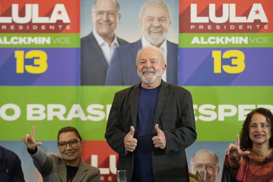 Brazil's former President Luiz Inacio &quot;Lula&quot; da Silva, who is running for reelection, flashes thumbs up after giving a statement to the media in Sao Paulo, Brazil, Monday, Oct. 3, 2022. Da S ...