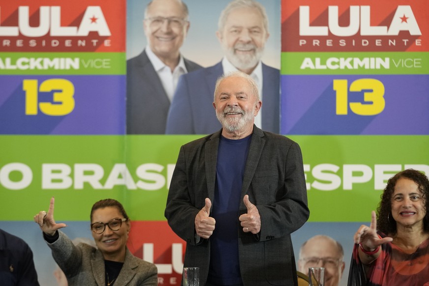 Brazil&#039;s former President Luiz Inacio &quot;Lula&quot; da Silva, who is running for reelection, flashes thumbs up after giving a statement to the media in Sao Paulo, Brazil, Monday, Oct. 3, 2022. ...