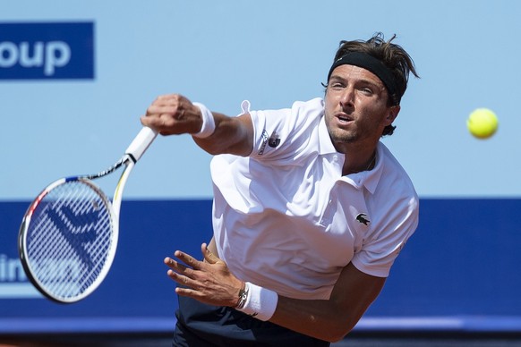 Arthur Rinderknech of France in action against Laslo Djere of Serbia during the quarter final round game at the Swiss Open tennis tournament in Gstaad, Switzerland, on Friday, July 23, 2021. (KEYSTONE ...