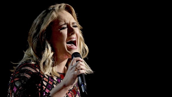 FILE - Adele performs at the 59th annual Grammy Awards in Los Angeles on Feb. 12, 2017. (Photo by Matt Sayles/Invision/AP, File)
Adele