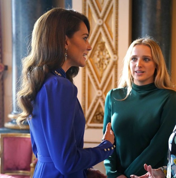 LONDON, ENGLAND - MAY 05: Catherine, Princess of Wales speaks with the First Lady of the United States, Dr Jill Biden and her grand daughter Finnegan Biden during a reception at Buckingham Palace for ...
