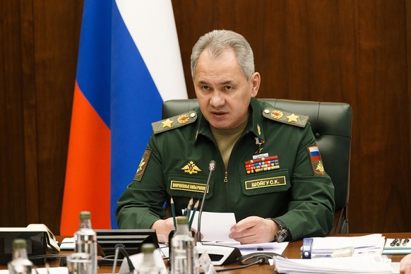 epa09852729 An undated handout still image made available on 26 March 2022 by the Russian Defence Ministry press service shows Russian Defense Minister Sergei Shoigu attends a working meeting with the ...
