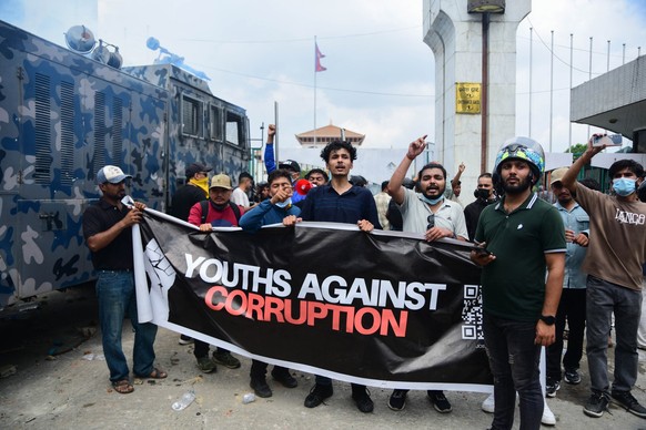 Gen Z protesters clash with police after breaking barricades outside the parliament house at the Federal Parliament in Kathmandu, Nepal, on September 8, 2025. The demonstration, which starts peacefull ...