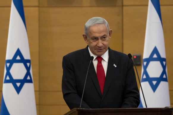 Israel&#039;s Prime Minister, Benjamin Netanyahu speaks at a meeting of his Likud party at Israel&#039;s parliament, the Knesset, for a vote on a contentious plan to overhaul the country&#039;s legal  ...