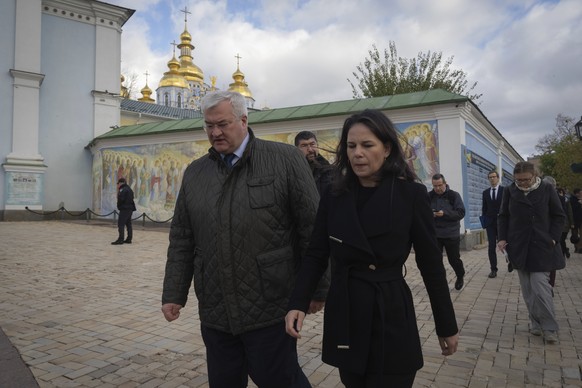 German Foreign Minister Annalena Baerbock, centre right, and Ukrainian Foreign Minister Andrii Sybiha walk in Kyiv, Ukraine, Monday, Nov. 4, 2024. (AP Photo/Efrem Lukatsky)