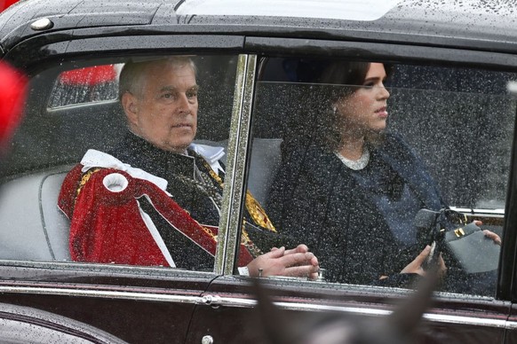 LONDON, ENGLAND - MAY 06: Prince Andrew, Duke of York and Princess Eugenie of York travelling in the state car during the Coronation of King Charles III and Queen Camilla on May 06, 2023 in London, En ...