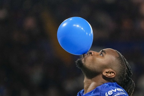 Chelsea&#039;s Christopher Nkunku celebrates after scoring his side&#039;s opening goal from a penalty spot during the Europa Conference League play-off first leg soccer match between Chelsea and Serv ...