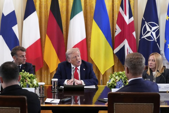 President Donald Trump speaks as France&#039;s President Emmanuel Macron, left, and Italy&#039;s Prime Minister Giorgia Meloni, right, listen during a meeting with Ukrainian President Volodymyr Zelens ...