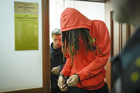 WNBA star and two-time Olympic gold medalist Brittney Griner leaves a courtroom after a hearing, in Khimki just outside Moscow, Russia, Friday, May 13, 2022. Griner, a two-time Olympic gold medalist,  ...