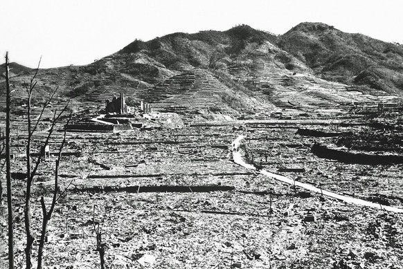 The only recognizable structure remaining is a ruined Roman Catholic Cathedral in the background on a destroyed hill. August 1945. On 9th August an atomic bomb had been dropped on the city by the Unit ...